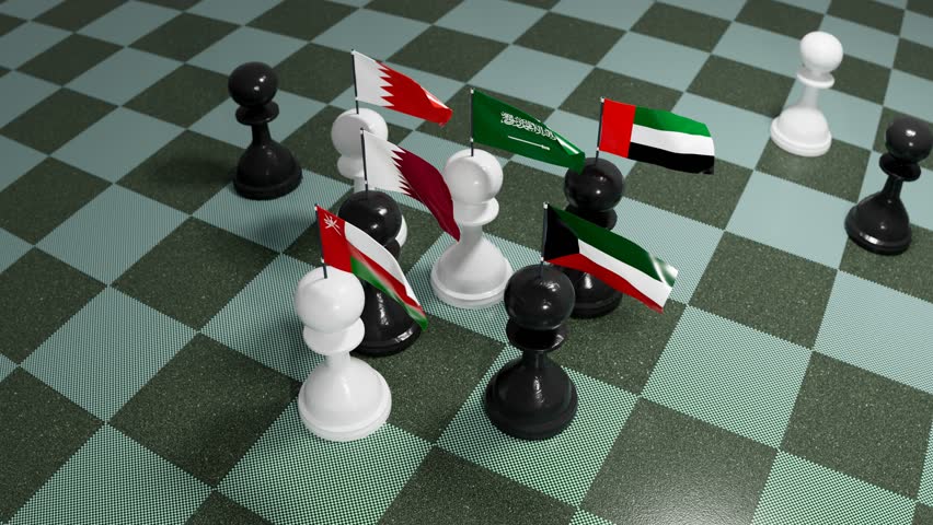 Chess pawns bearing Gulf Arab country flags arranged on a chessboard represent geopolitics.
