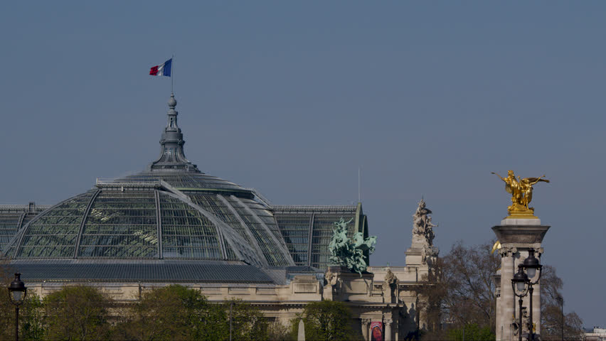 Le Grand Palais in Paris with the French flag