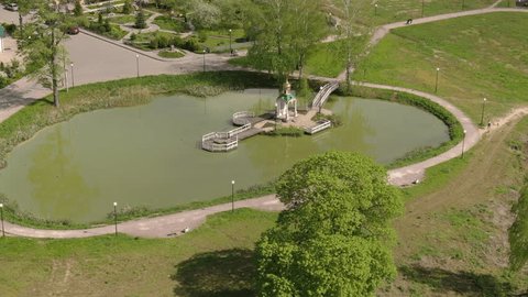 Drone Circling above Pond Klin Park