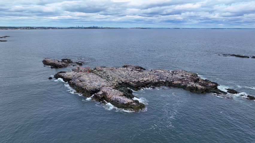 Black Rock aerial view in a cloudy at the coast of Cohasset in town of Hull, Massachusetts MA, USA. 
