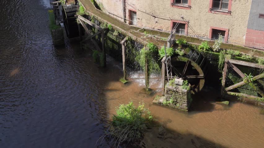 Saar river water grain mill in the town of Saarburg, Germany Old European