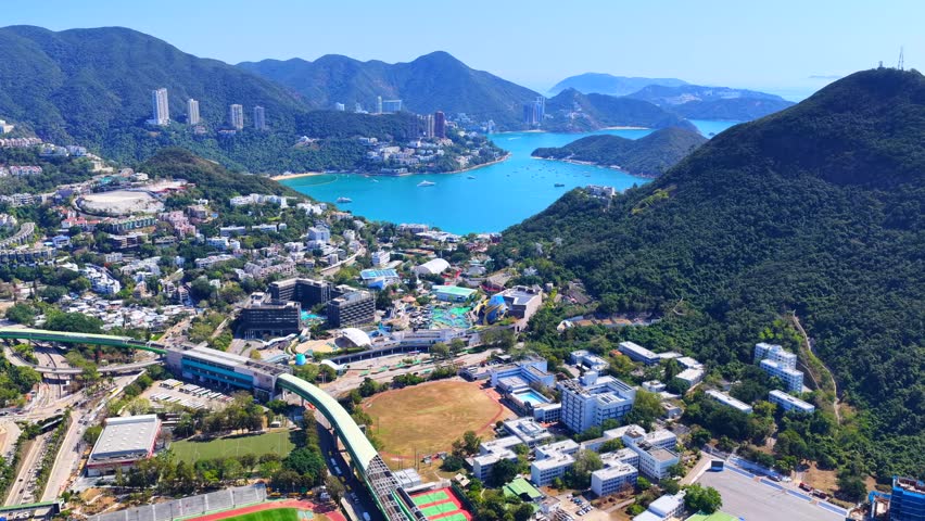 Aerial footage of Hong Kong southern coastline showcases natural stone forests amid urban landscapes at Pok Fu Lam, Aberdeen, Wong Chuk Hang, Ap Lei Chau, Lei Tung, Deep Water Bay, and Shouson Hill
