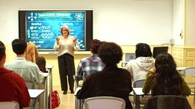 Diverse group of high school students actively participating in a chemistry lesson, raising their hands to answer the teacher's question - Powered by Shutterstock - Get 15% off with code: PIKWIZARD15