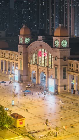 Night Time-lapse of Passengers Entering South Square of Hankou Railway Station, Wuhan, Hubei, China