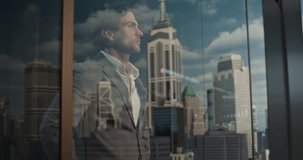 White Businessman in a Gray Suit Stands in a High-rise Office, Focused on Startup Planning and Financial Growth, Projecting Ambition, Entrepreneurial Confidence and Successful Smile. - Powered by Shutterstock - Get 15% off with code: PIKWIZARD15