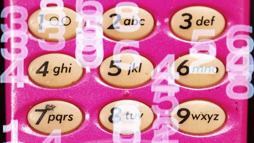 macro closeup on the keypads of a collection of retro and old mobile telephones