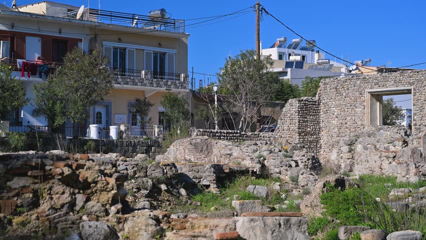 View of ancient ruins on the island of Kos, Greece showing stone remains and archaeological structures