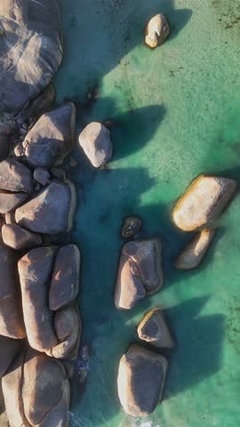 Vertical aerial drone view of Elephant Rocks Beach and Elephant Cove. William Bay National Park near Denmark. Stunning natural rock formations surrounded by turquoise waters.