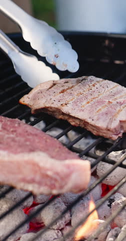 Food, barbecue and closeup of meat on grill for social gathering, party and hangout together in summer. Fire, cookout and steak with flames for bbq for holiday, celebration and reunion on weekend