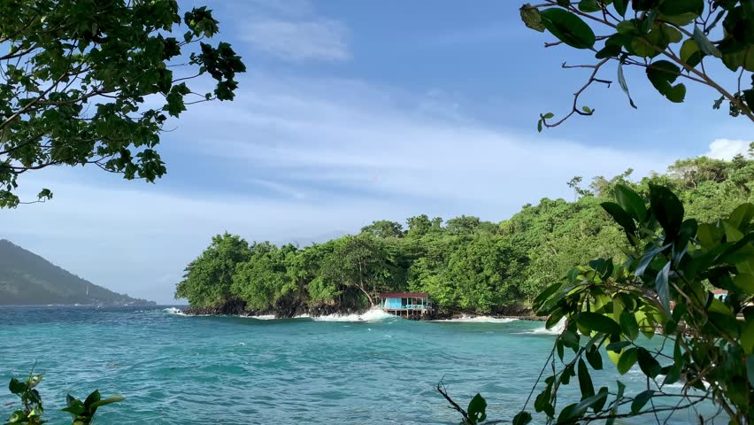 beautiful sea and mountain views, beautiful blue sea, vacation at the beach, mountain view from the beach, ocean waves, clean sea water.