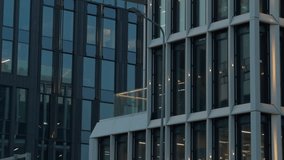 Urban skyline with glowing windows. Dusk scene featuring reflective glass and subtle interior illumination - Powered by Shutterstock - Get 15% off with code: PIKWIZARD15
