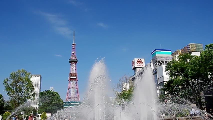 SAPPORO, JAPAN - JUNE. 6 : Fountain Splash and Sapporo TV Tower on June 6, 2013