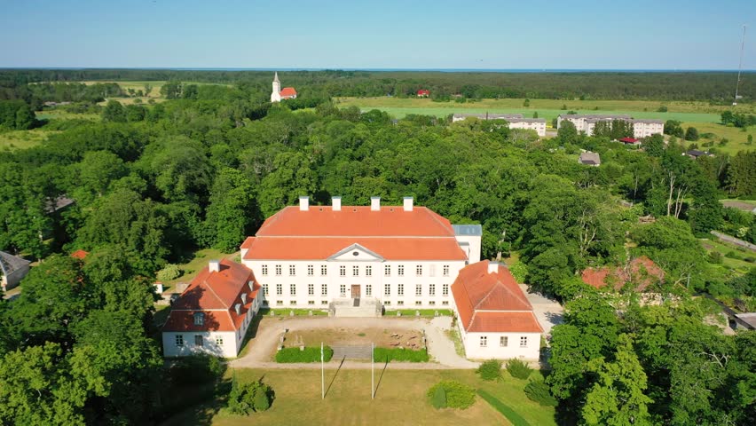 Aerial 4K video from a drone to Suuremoisa baroque manor ensemble in Estonia.  Hiiumaa, Estonia, baltic.