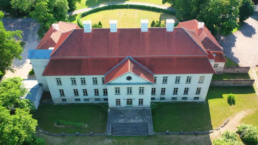 Aerial 4K video from a drone to Suuremoisa baroque manor ensemble in Estonia.  Hiiumaa, Estonia, baltic.