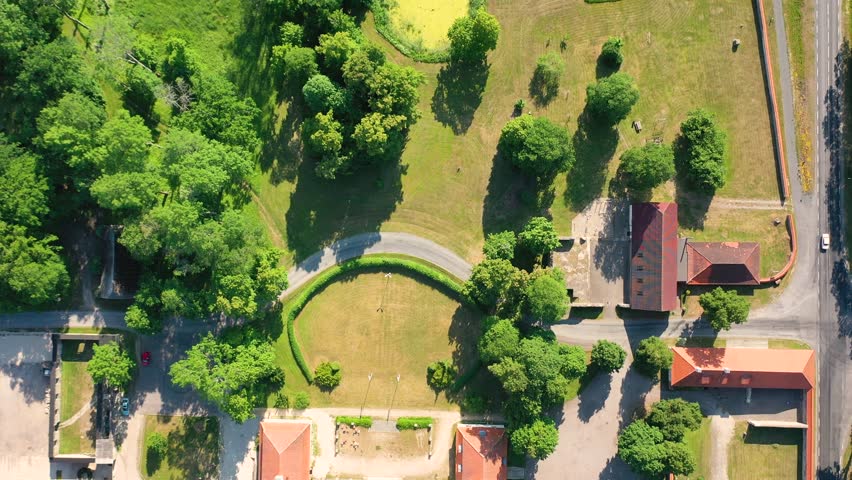 Aerial 4K video from a drone to Suuremoisa baroque manor ensemble in Estonia.  Hiiumaa, Estonia, baltic.