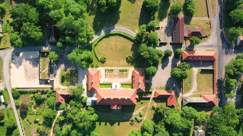 Aerial 4K video from a drone to Suuremoisa baroque manor ensemble in Estonia.  Hiiumaa, Estonia, baltic.