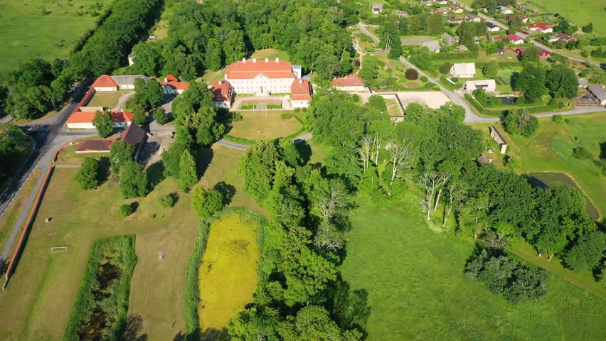 Aerial 4K video from a drone to Suuremoisa baroque manor ensemble in Estonia.  Hiiumaa, Estonia, baltic.