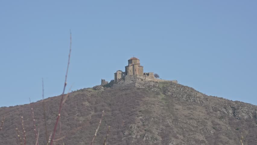 Jvari Monastery on Hilltop Under Clear Blue Sky