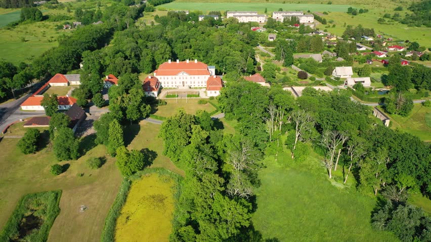 Aerial 4K video from a drone to Suuremoisa baroque manor ensemble in Estonia.  Hiiumaa, Estonia, baltic.