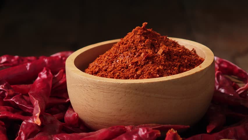 Chili powder in a wooden bowl	