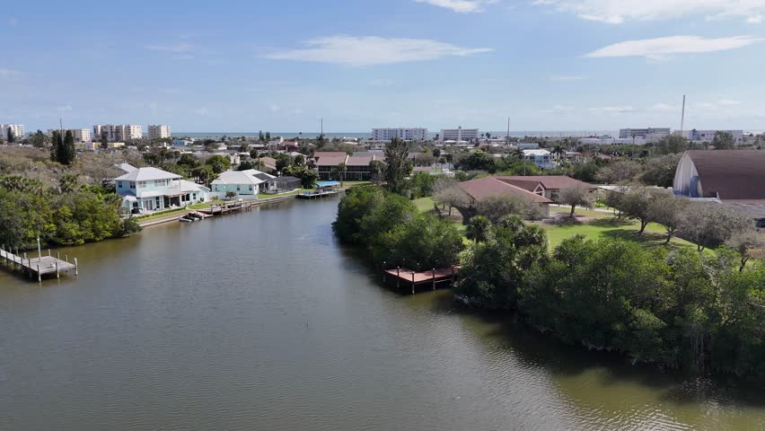 Drone Shot of Luxury Villa Near Water with Boat Dock 4K