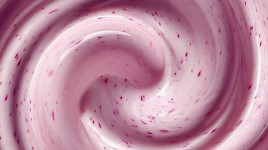 A soft abstract background for promos, motion videos, or concept videos. 4K video of a pink strawberry milk swirl texture. Can also be used to promote food and beverage products on social media.