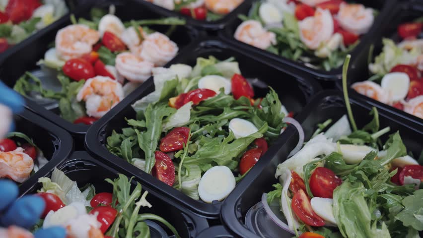 Professional seafood salad assembly for takeaway food service