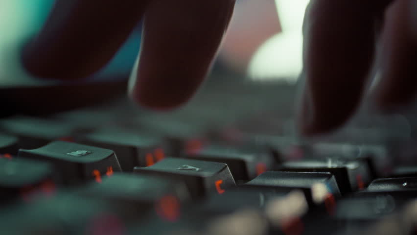 In a focused extreme close-up, a programmer