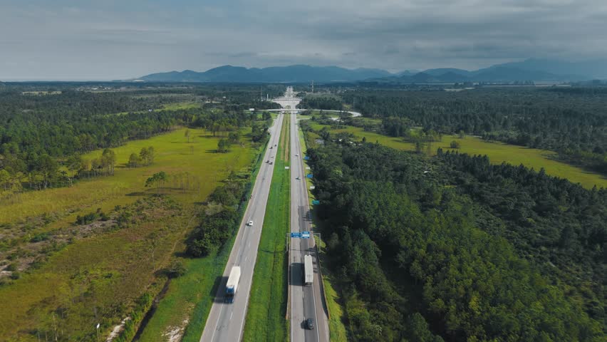 Aerial view of the straight highway BR101 in the state of Santa Catarina near the city of Florianopolis in Brazil