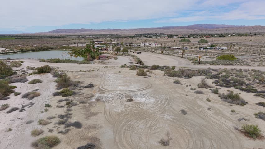 Aerial views showcase the North Shore of the Salton Sea, highlighting the impacts of pollution on this failed development in California.