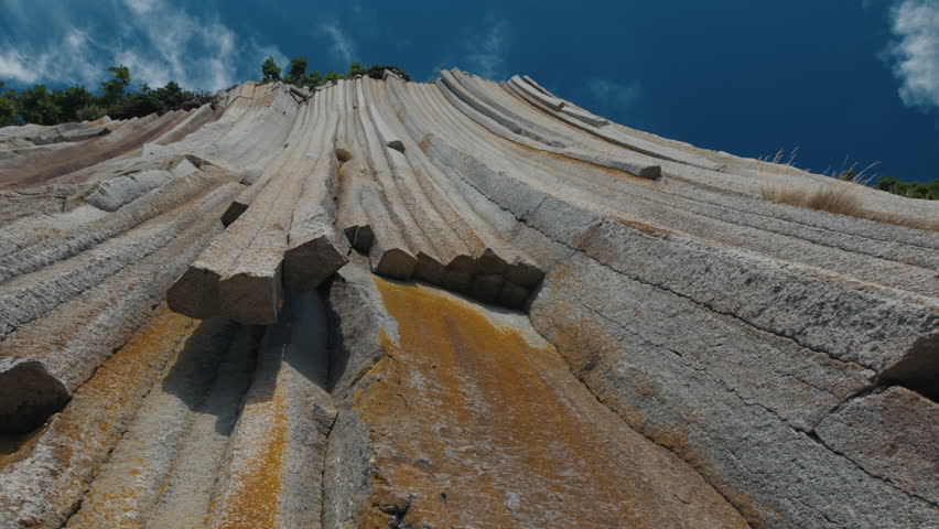 Close up view of the Cape Stolbchaty on the west shore of Kunashir Island with its unique rock formations, Kuril Islands, in Sakhalin Oblast, Russia