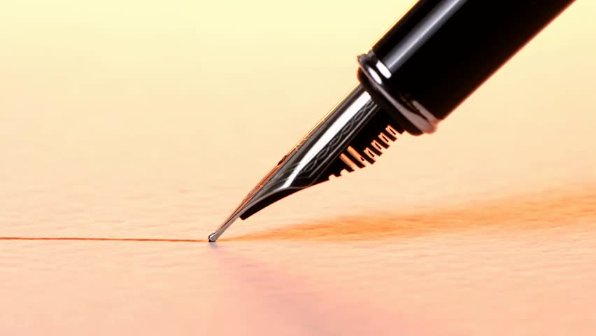 Close-up of a fountain pen drawing a straight ink line on textured paper, highlighting writing, calligraphy, and artistic stationery details.
