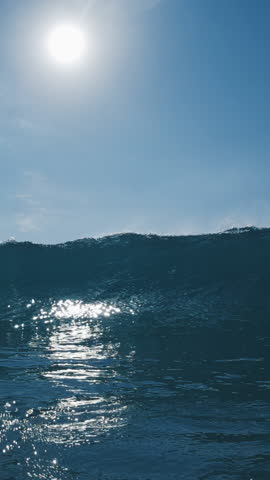 Ocean wave breaks on the camera. Atlantic Ocean