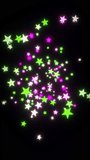 Vibrant green and purple stars fly toward the camera with glowing trails on black background - Powered by Shutterstock - Get 15% off with code: PIKWIZARD15