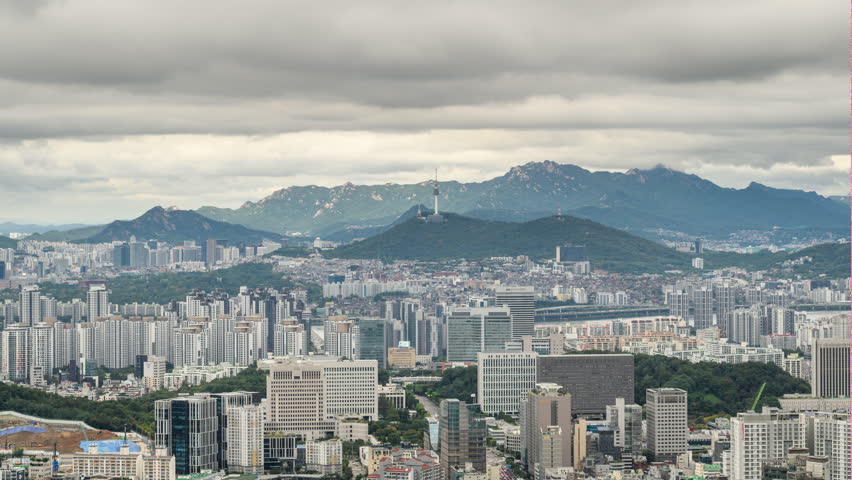 Seoul Summer Timelapse with Panoramic Cityscape under Cloudy Sky
