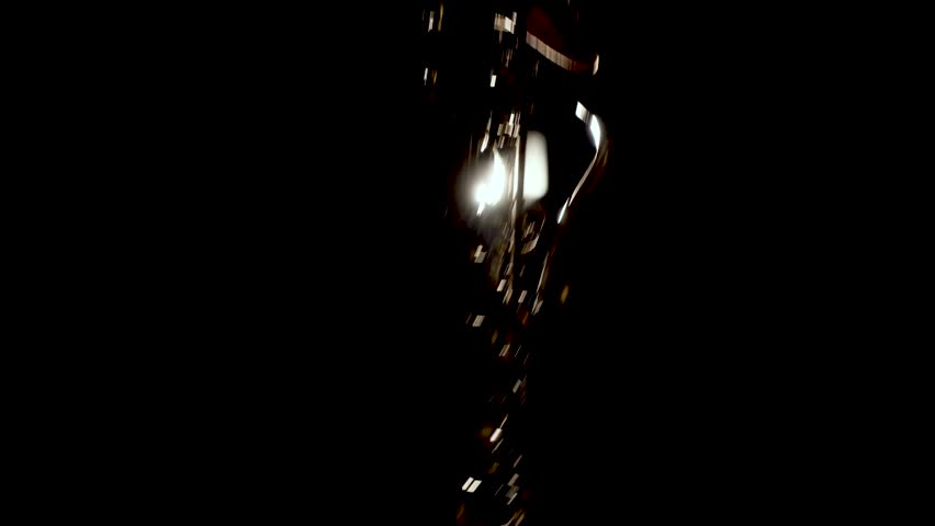Close up video of musician man playing saxophone. Low light and selective focus. Saxophone player closeup video