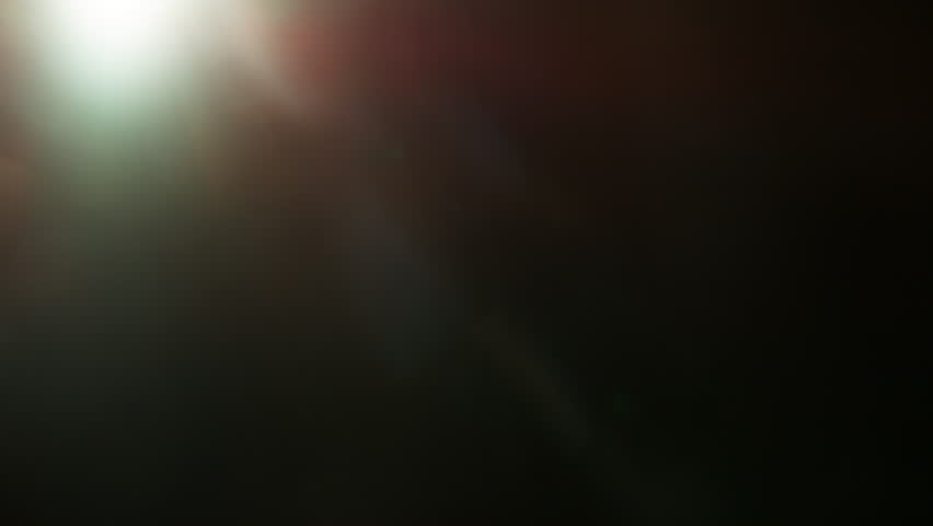 Real Cinematic Lens Flare Overlay on Black Background at 1000fps Slow Motion.