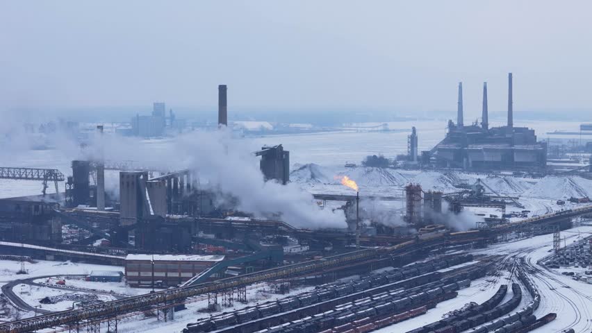 Zug Island Industrial pollution emission from steel mill with power plant on the River Rouge, Michigan, USA