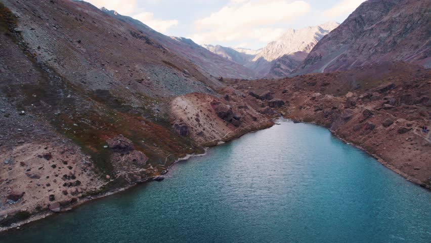 4K Aerial view of Deepaktal lake at Lahaul, Himachal Pradesh, India. Turquoise blue glacier water lake during summer. Bird eye view of Deepaktal Lake. Nature Background.