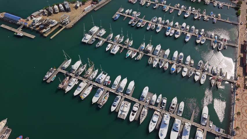 Aerial view of Santa Marta marina, boats docked in calm waters, Colombia