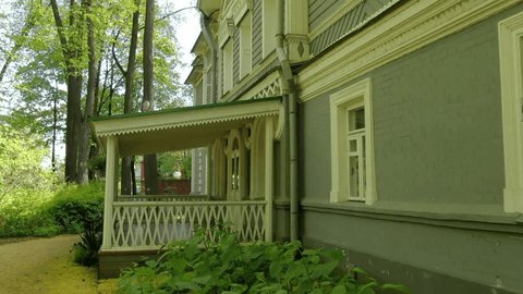 Drone Flying along Facade Historic Wooden House