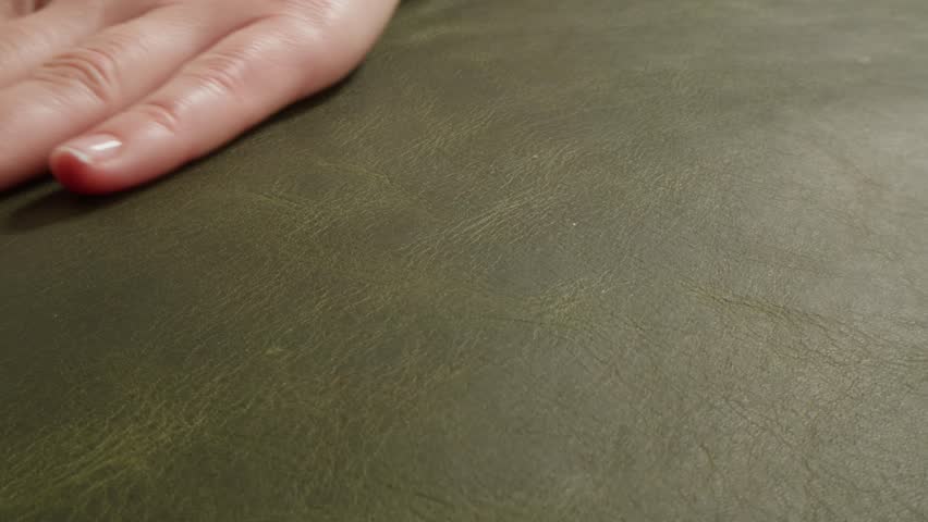 Genuine green leather texture, natural animal skin, luxury vintage cowhide background. Eco friendly leatherette, faux leather. Wallpapere, backdrop, copy space