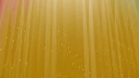 Golden viscous liquid with moving bubbles and shimmering light rays creating a beautiful background - Powered by Shutterstock - Get 15% off with code: PIKWIZARD15