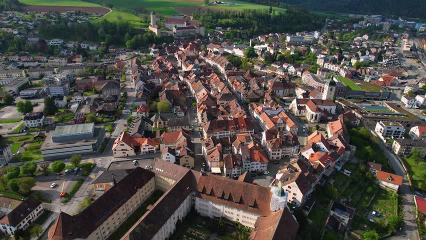 Aerial panorama view of the old town in the city Porrentruy in Switzerland on a sunny noon in summer.