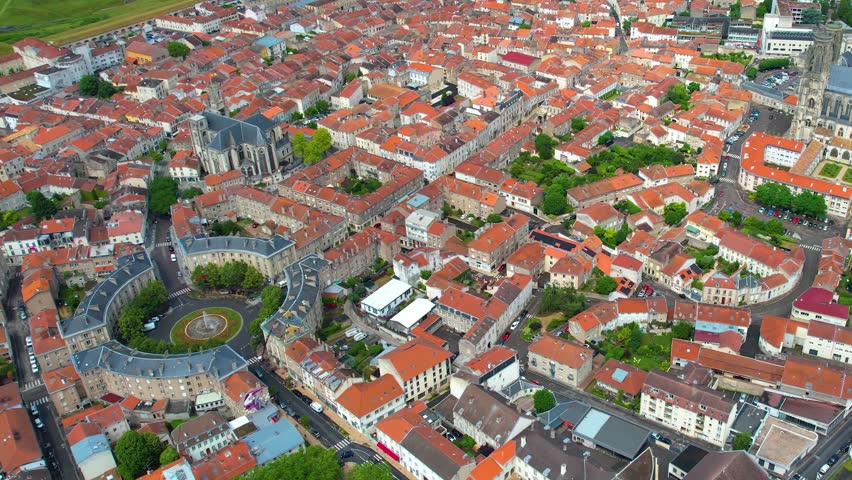Aerial view around the old town of the city Tolou on a cloudy spring noon in France.