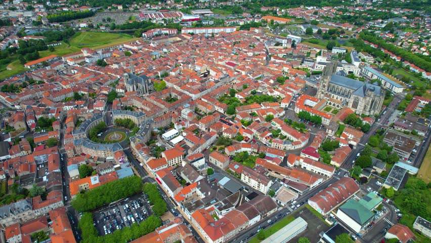Aerial view around the old town of the city Tolou on a cloudy spring noon in France.