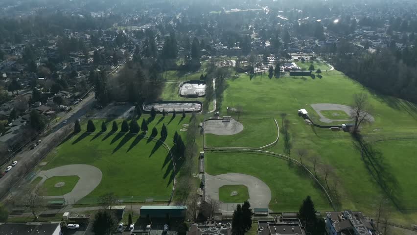 Whalley Athletic Park During Sunset In Surrey, British Columbia, Canada. Aerial Rotate Shot