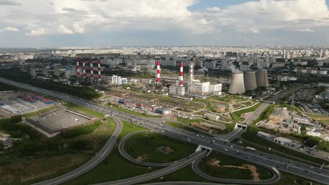 Drone Zoom toward Industrial Power Plant City