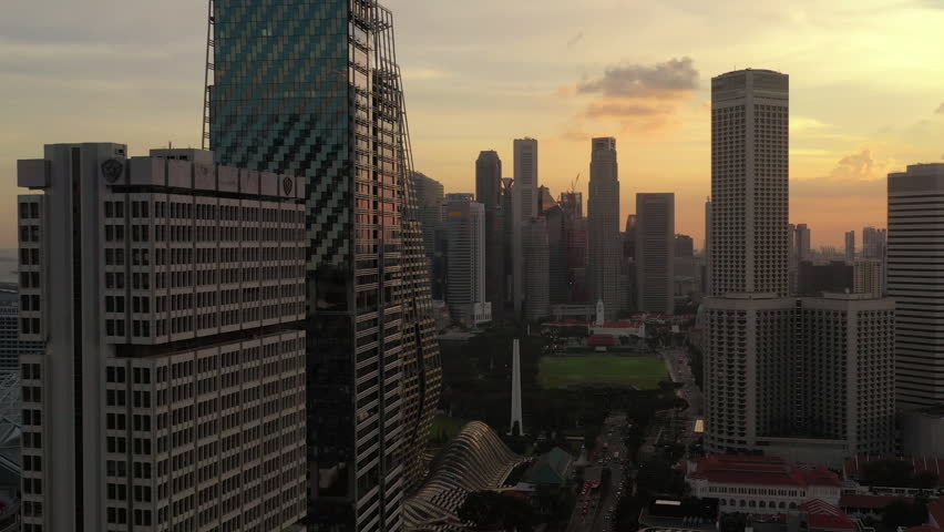 sunset sky singapore city downtown aerial panorama 4k