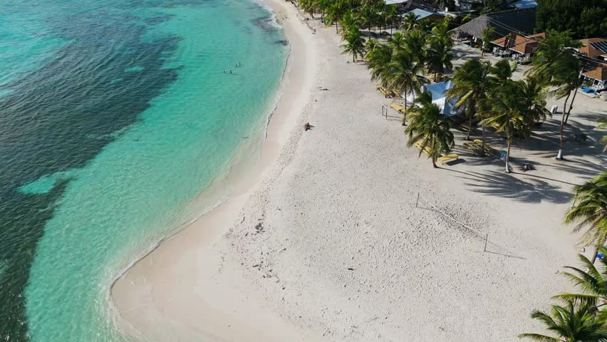 Beautiful beach with crystal clear waters located in the town of "Mano Juan" on Saona Island, Dominican Republic.